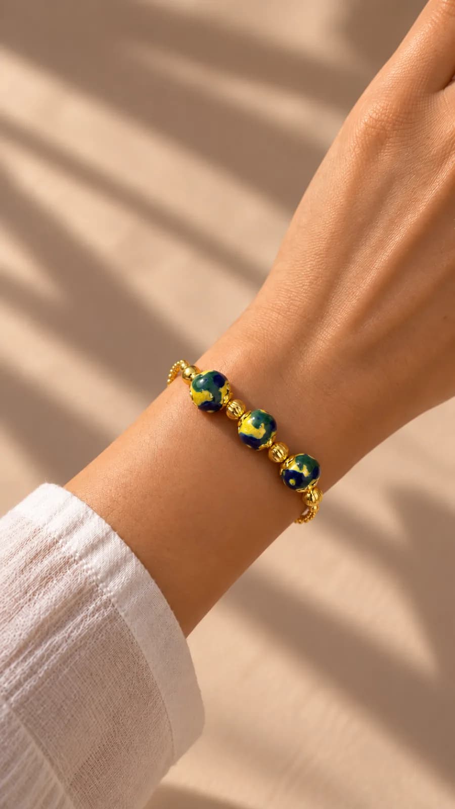 Yellow and Green Floral Blue Pottery Bracelet — 1